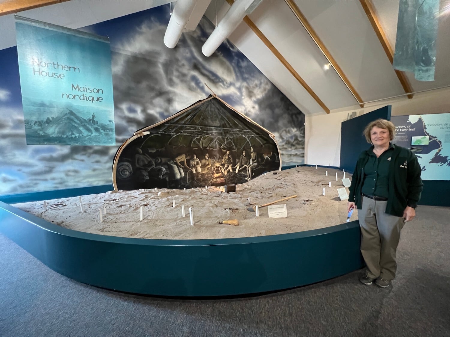 Inside the visitor center at Port au Choix National Historic Site, interpreter Audrey Rumbolt shows a reconstructed Dorset house. Inside the visitor center at Port au Choix National Historic Site, interpreter Audrey Rumbolt shows a reconstructed Dorset house.