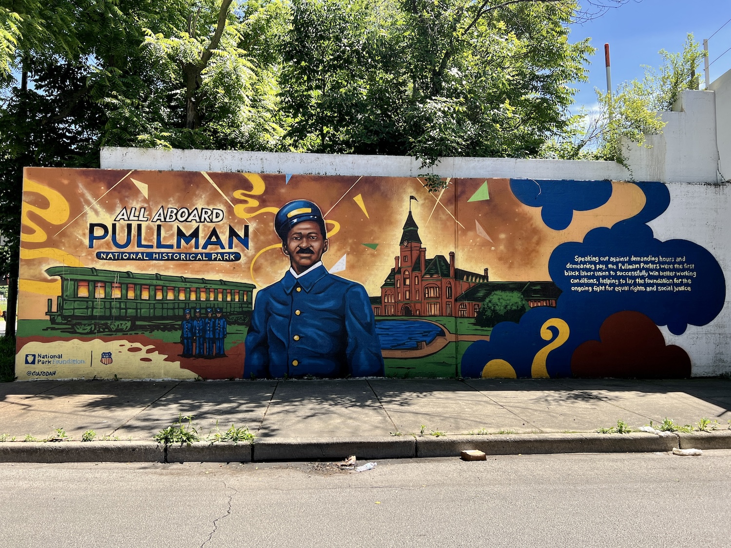 Along S. Cottage Grove Ave., you'll find a mural celebrating the Pullman porters and Pullman National Historical Park. Along S. Cottage Grove Ave., you'll find a mural celebrating the Pullman porters and Pullman National Historical Park.