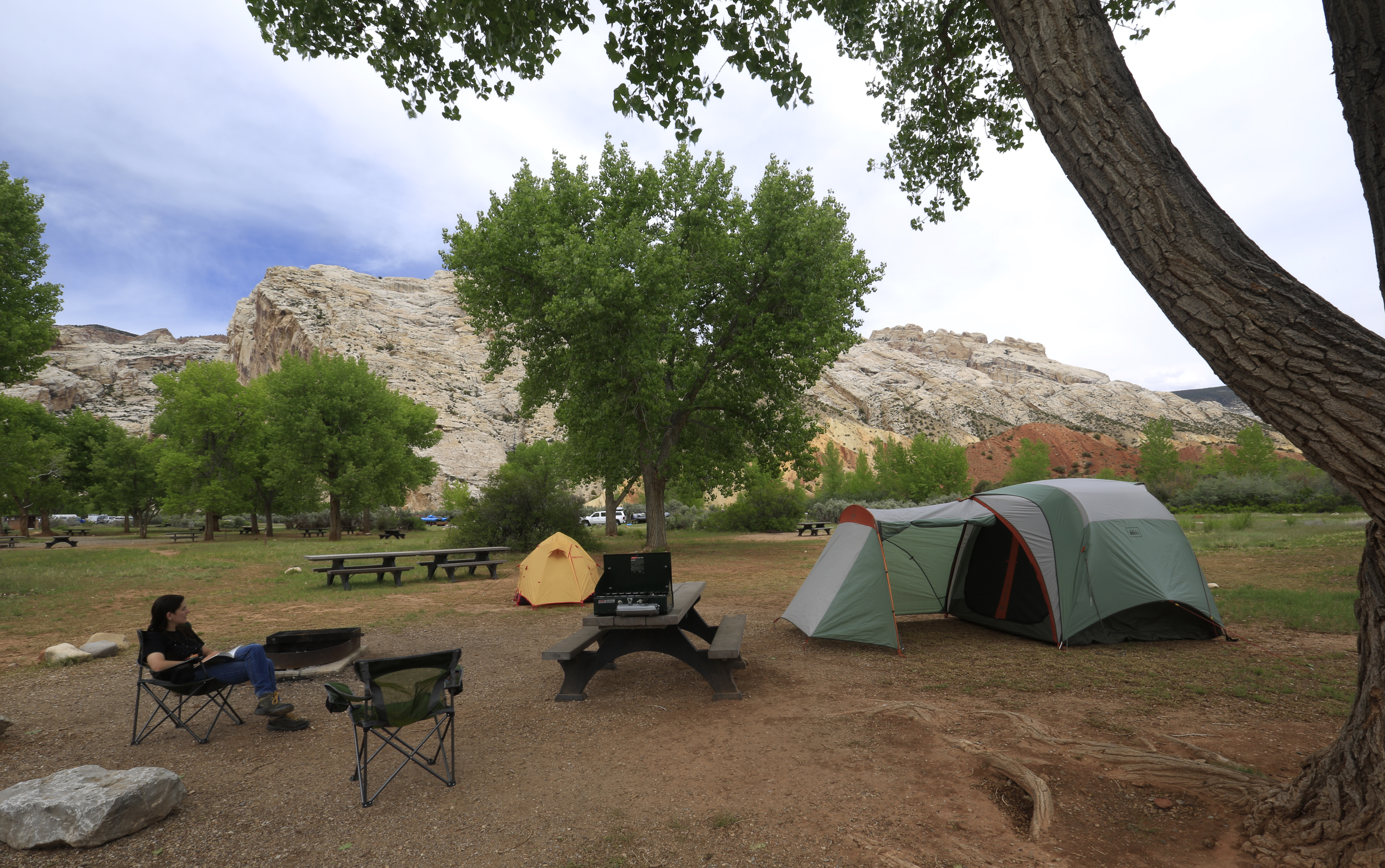 A camper enjoys the Split Mountain Campground / NPS A camper enjoys the Split Mountain Campground / NPS
