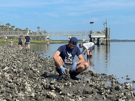 University of North Florida students installing POSH units to help combat coastal erosion/UNP