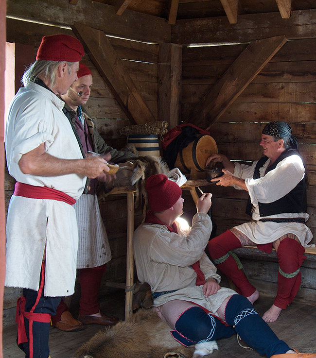 Voyageurs reenactors at rest, Voyageurs National Park / National Park Service