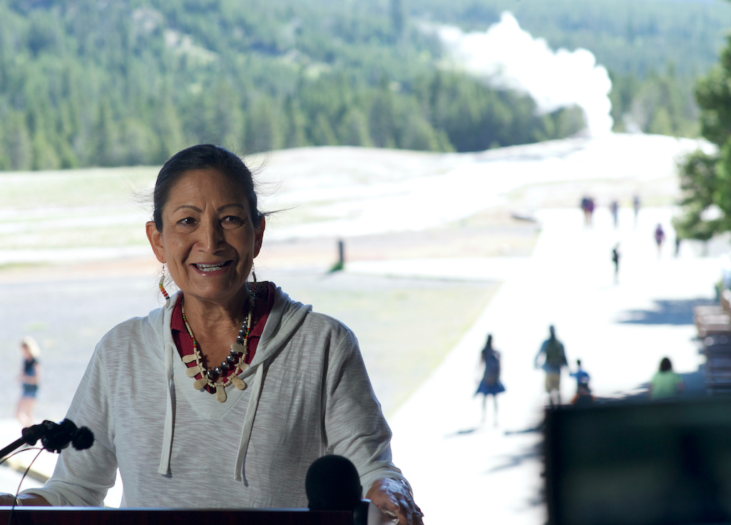 Secretary of the Interior Deb Haaland talks to the press in front of Old Faithful on July 8, 2022. (Angus M. Thuermer, Jr./WyoFile) Secretary of the Interior Deb Haaland talks to the press in front of Old Faithful on July 8, 2022. (Angus M. Thuermer, Jr./WyoFile)