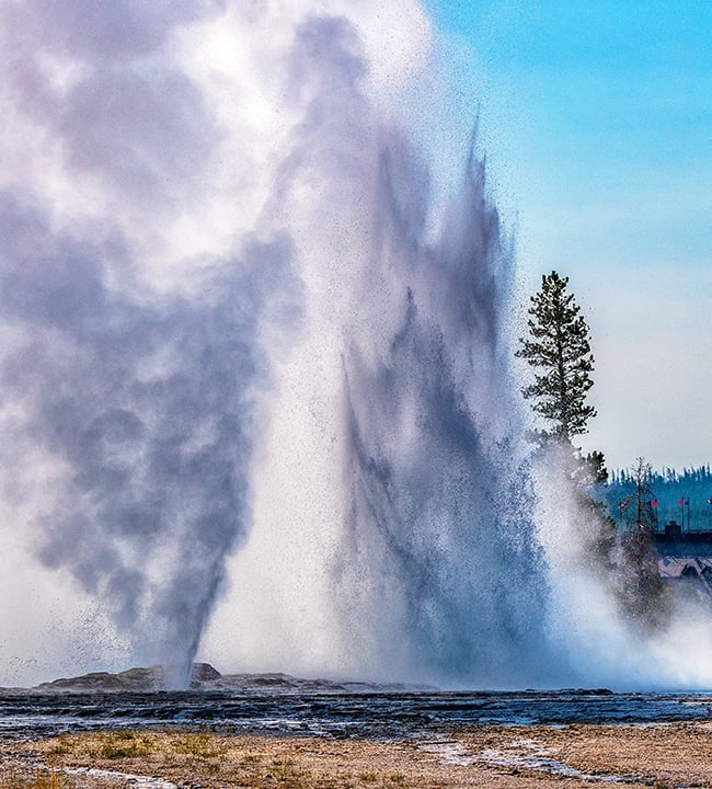 Grand Geyser erupting in 2018, Upper Geyser Basin, Yellowstone National Park / Rebecca Latson