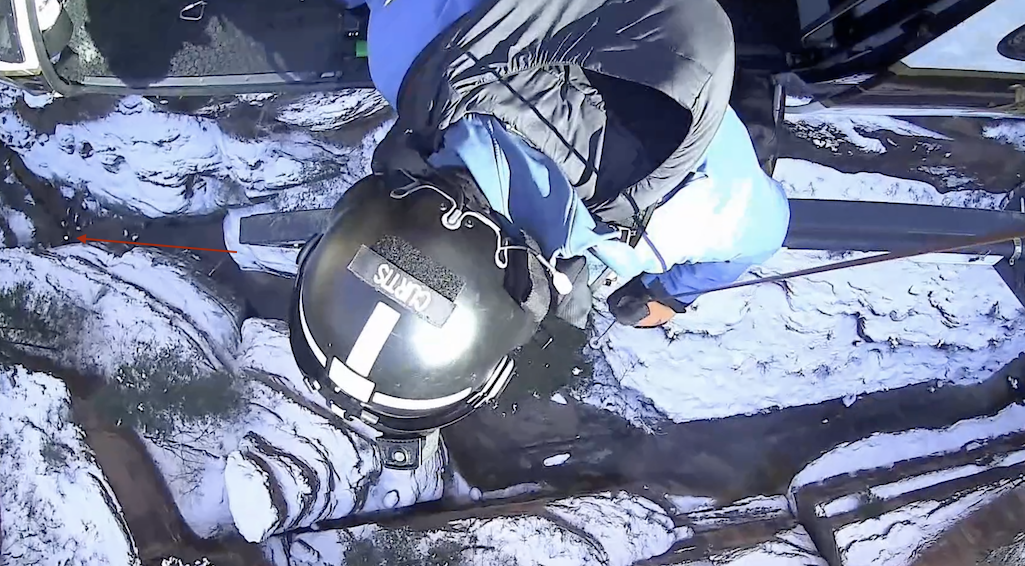 A strobe light (red arrow) affixed to the helmet of a Utah Department of Public Safety officer helped guide the rescue helicopter to the extraction location/Utah Department of Public Safety A strobe light (red arrow) affixed to the helmet of a Utah Department of Public Safety officer helped guide the rescue helicopter to the extraction location/Utah Department of Public Safety