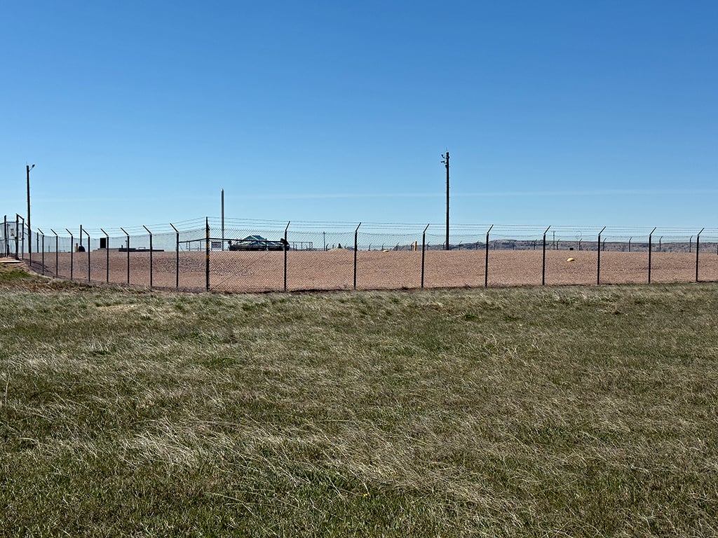 A fenced-in area in which resides the Delta-09 missile silo
