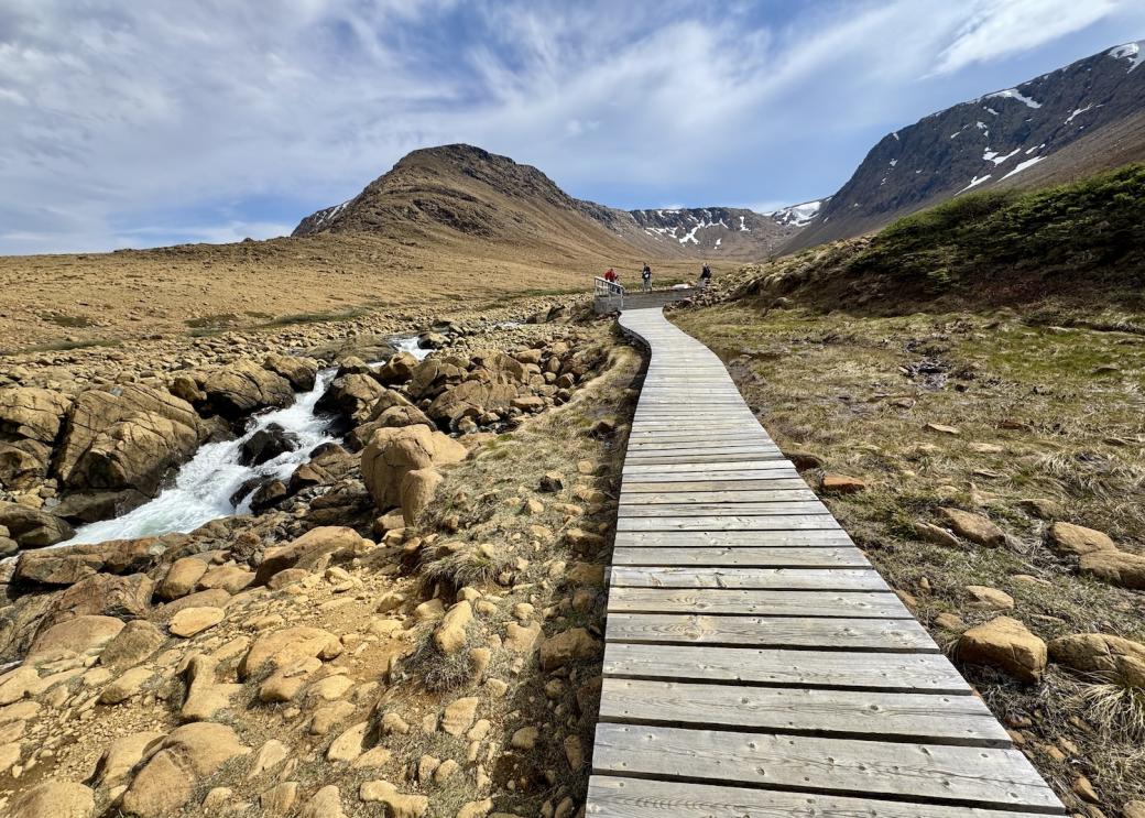 The Tablelands Trail is a geological wonder and follows an old roadbed as it skirts the base of a mountain.