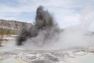 Hydrothermal explosion at Biscuit Basin in Yellowstone National Park. These types of events are the most likely explosive hazard from the Yellowstone Volcano. (Click image to view full size.)