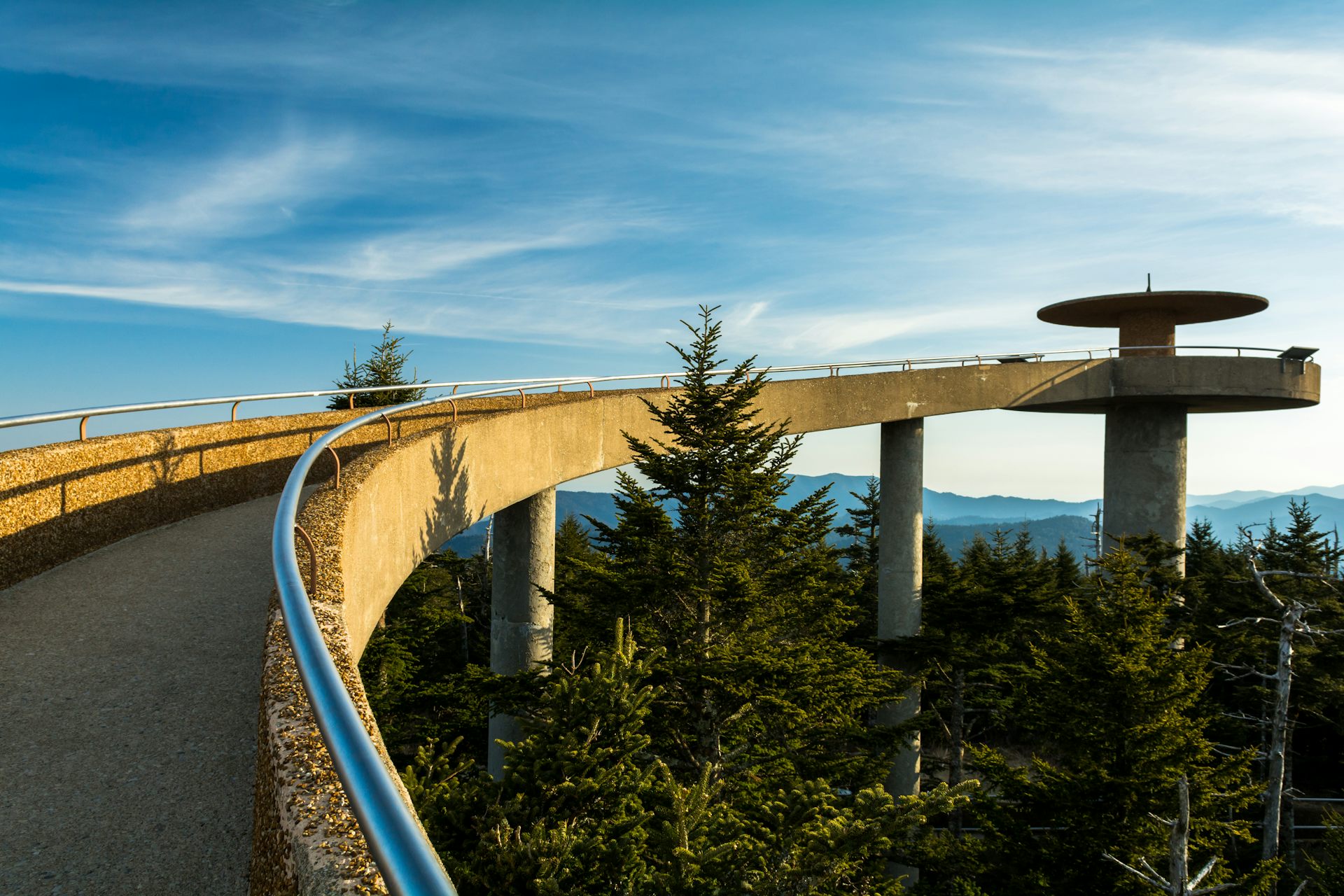 A concrete ramp winds its way to an observation tower in the Great Smoky Mountains National Park.