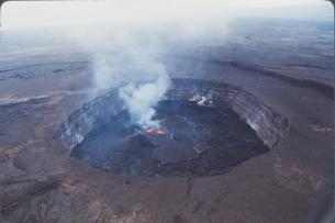 Color photograph of volcanic eruption in crater
