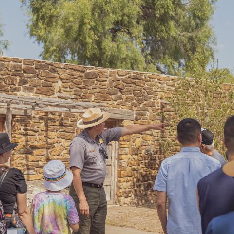 Andrew Shirley with a ranger led tour group at San Antonio Missions National Park. NPS photo.