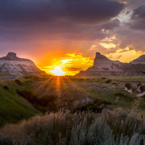 Michell Pass with a sunset in between the bluffs, Scotts Bluff National Monument