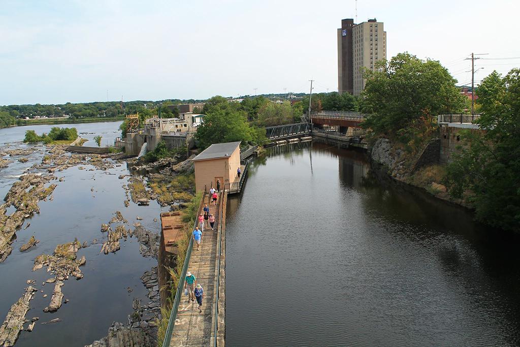 A modern view of the Northern Canal Walkway at Lowell National Historical Park