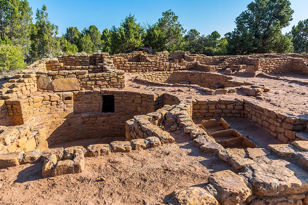A keyhole kiva and other stonework ruins of Coyote Village, at the Far View complex of ruins in Mesa Verde National Park