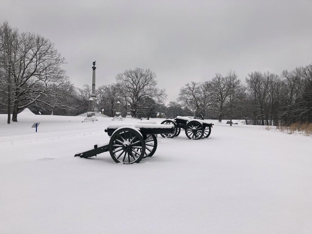 Snow covers two cannons at Shiloh National Military Park