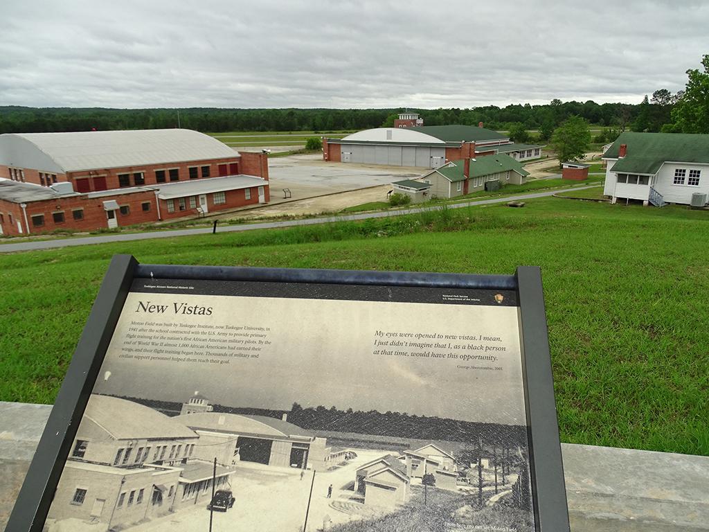 An interpretive sign overlooking the Tuskegee Airmen National Historic Site in Alabama
