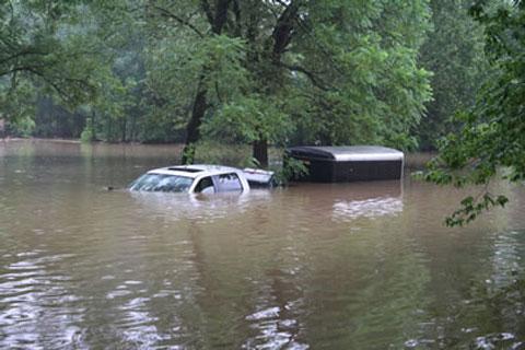 Vehicle caught by flood.