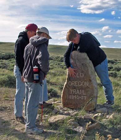 Students with trail marker