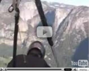 Hang glider soaring through Yosemite National Park, with video on YouTube