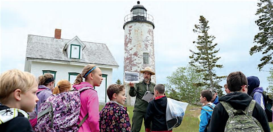 Ranger Michael Marion talks about the history of Baker Island in Acadia National Park while leading a tour. Friends of Acadia has provided funds to help preserve the island’s historic structures/FOA, Julia Walker Thomas
