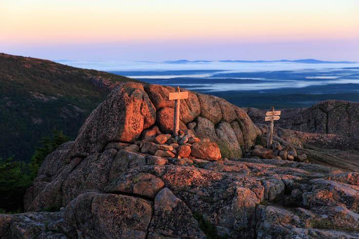 The barren summit of Pemetic Mountain in Acadia National Parks offers spectacular views in all directions / Friends of Acadia