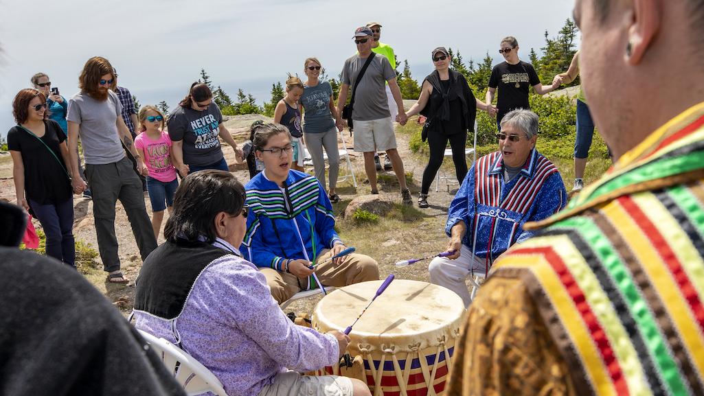 The Burnurwurbskek Singers,a Penobscot male drum group, performs at Cadillac Mountain Summit/Will Newton, Friends of Acadia