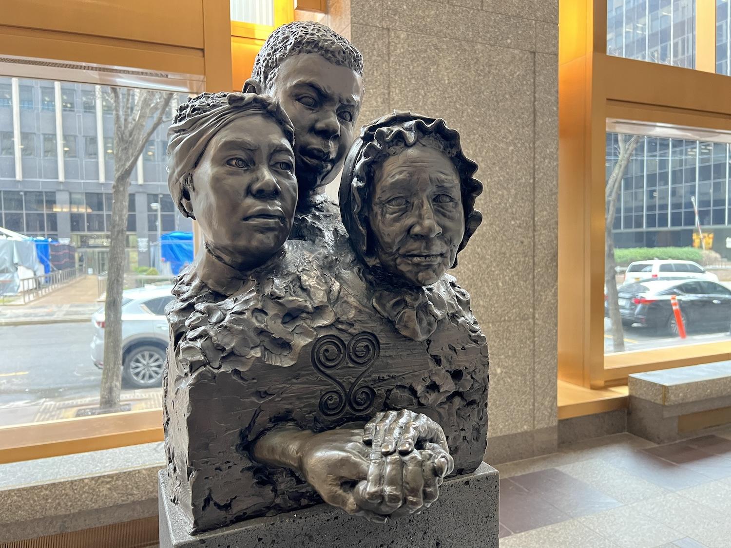 In the Fred Weiss Federal Building lobby, Unearthed by Frank Bender shows what he imagines three people look like whose remains were unearthed at the African Burial Ground.
