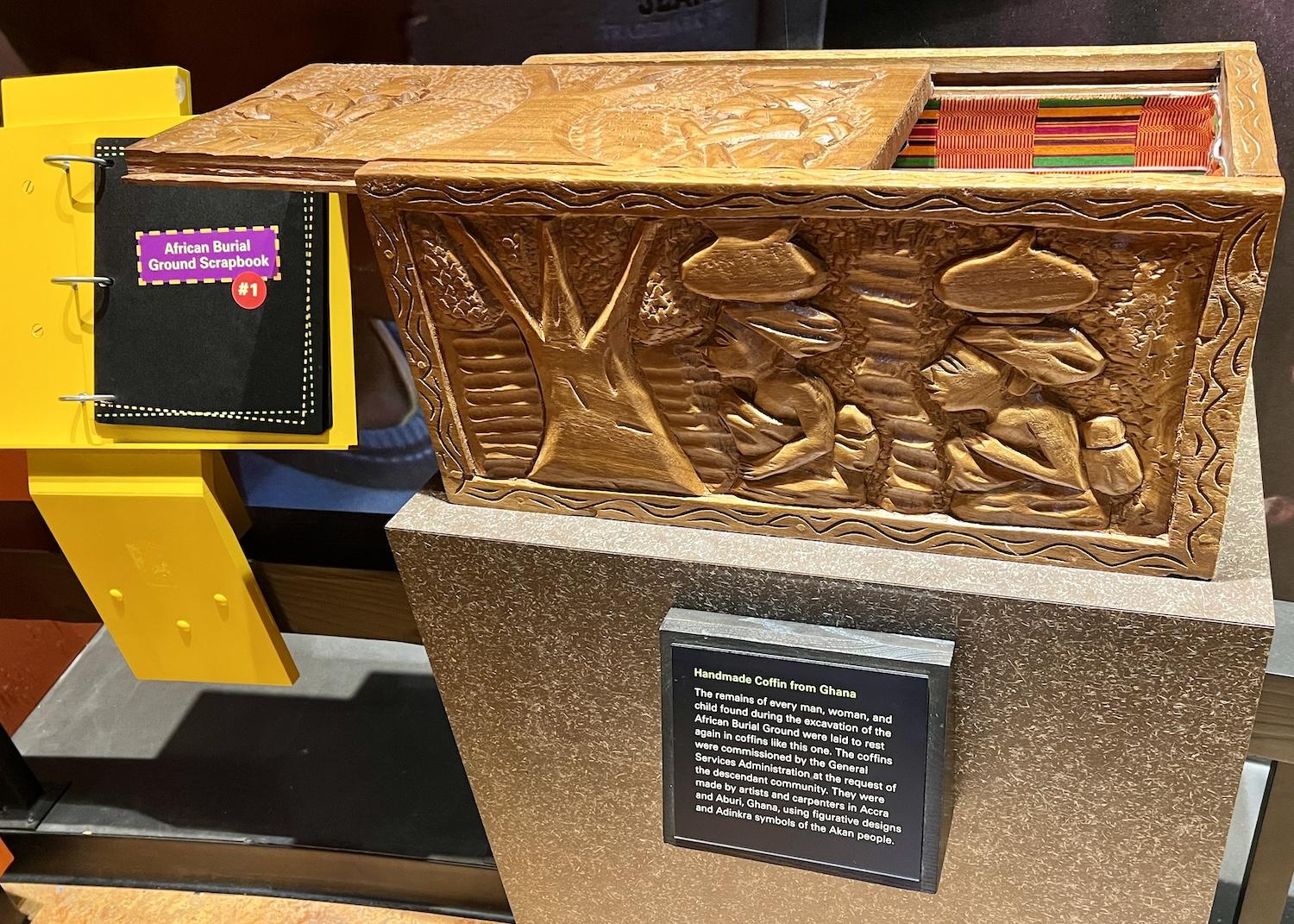 You can touch a handmade coffin from Ghana in the African Burial Ground National Monument visitor center.