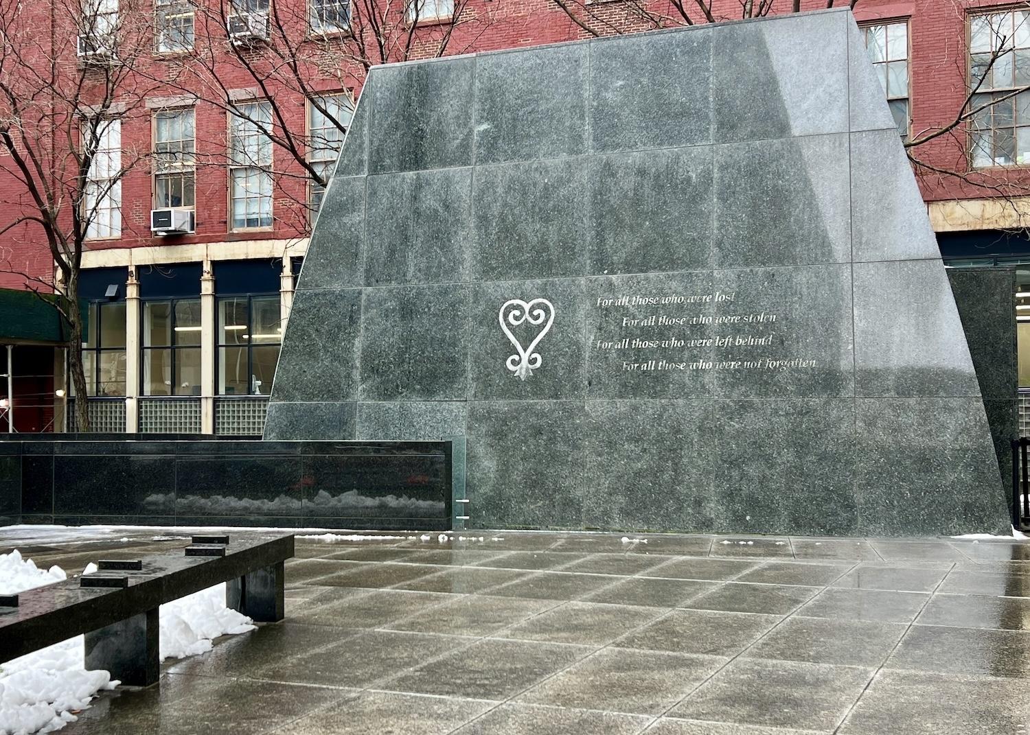 A four-sentence inscription, and a Sankofa image, are etched into the Wall of Remembrance on one side of the Ancestral Chamber.