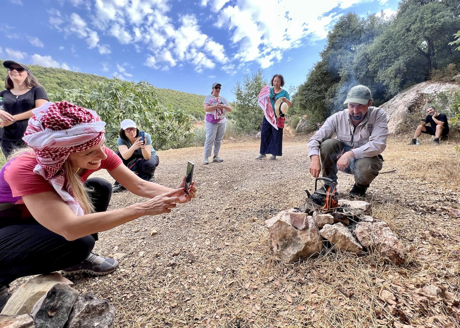 In Ajloun Forest Reserve, RSCN guide Rafat Mohamed Ali Quduh makes tea for hikers.