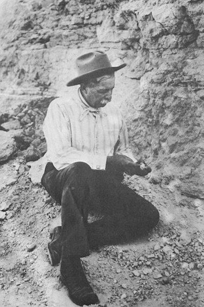 James Cook examining fossils around 1918/NPS archives
