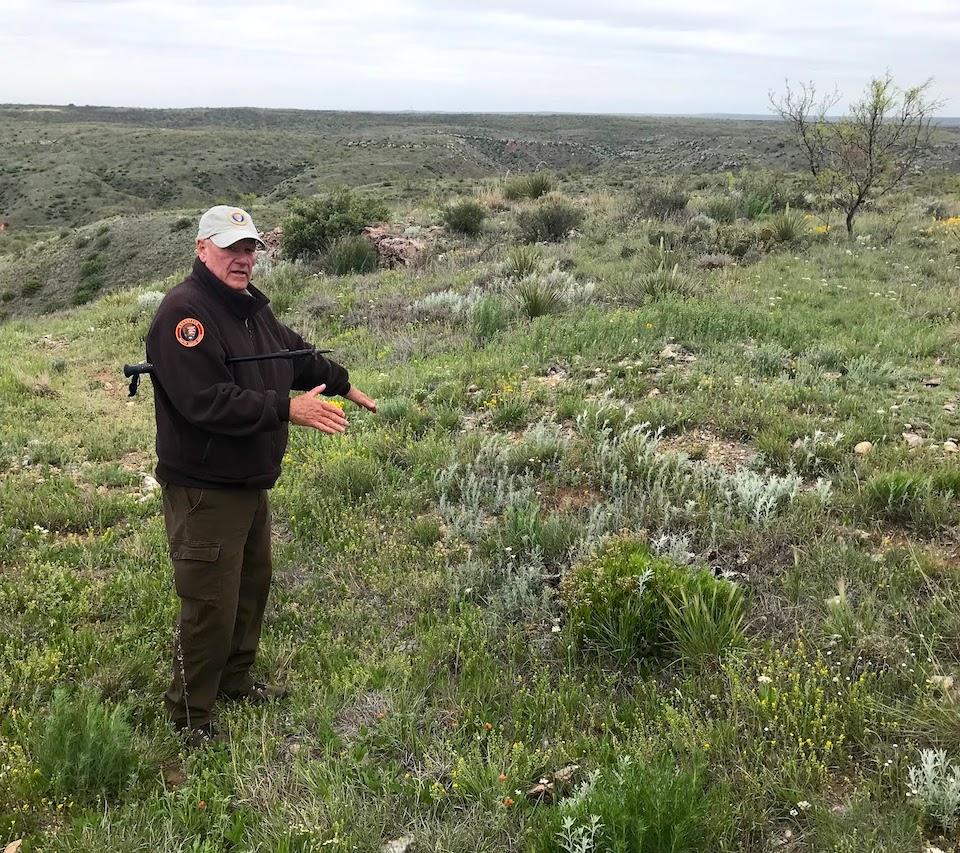 Park volunteer and our guide, Ron Payne, pointing out one of the 700 or so pits where flint was quarried
