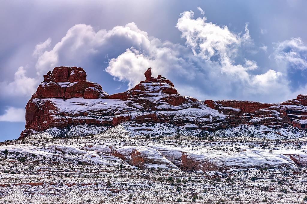 Snowy winter weather, Arches National Park / Rebecca Latson
