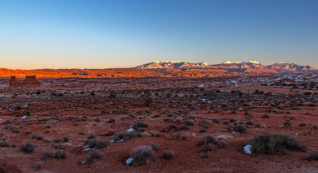Sunset over the La Sal Mountains view area, Arches National Park / Rebecca Latson