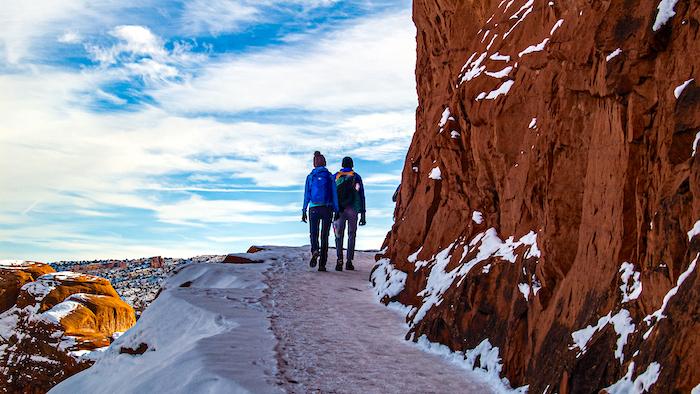 The trail past Twisted Doughnut Arch is a somewhat tight squeeze, made even more dicy by snow and ice/Eric Jay Toll