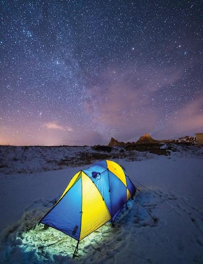Tent and stars at Badlands National Park/Bryan Hansel