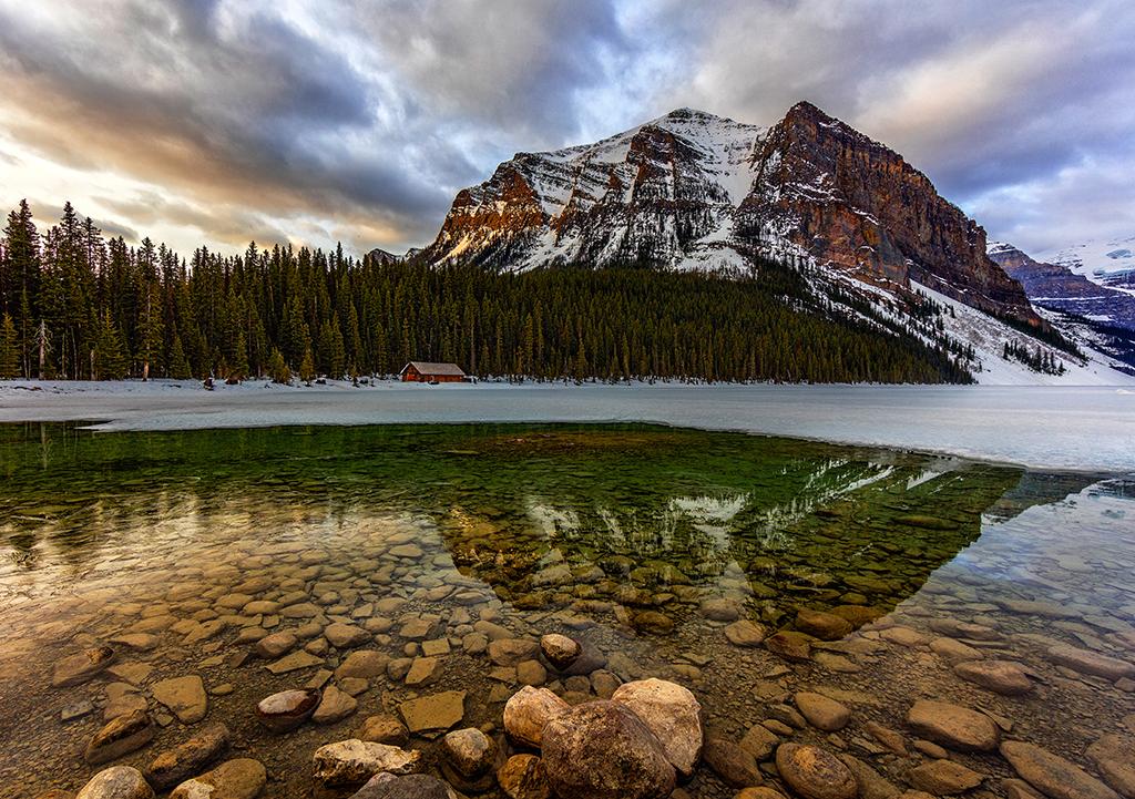 A springtime sunrise over Mt. Temple and Lake Louise, Banff National Park / Rebecca Latson