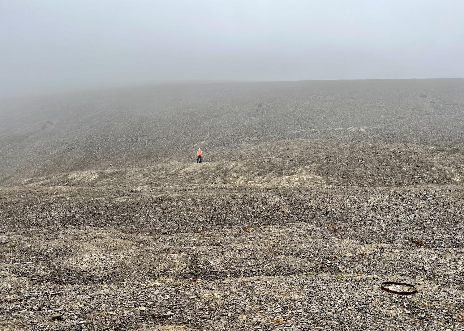 One of Adventure Canada's polar bear monitors keeps an eye out during a landing at Beechey Island, Nunavut.