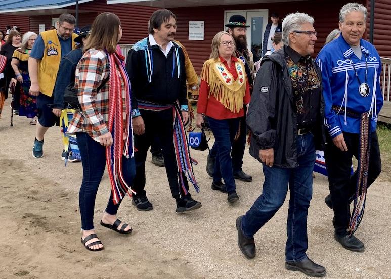 Minister of Northern Affairs Daniel Vandal and Senator Marty Klyne take part in a Grand Opening for the historic land transfer at Batoche National Historic Site.