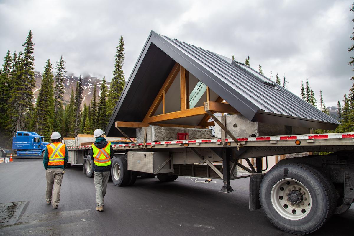 Unloading the roof of a new washroom building at the Peyto Lake day use area.