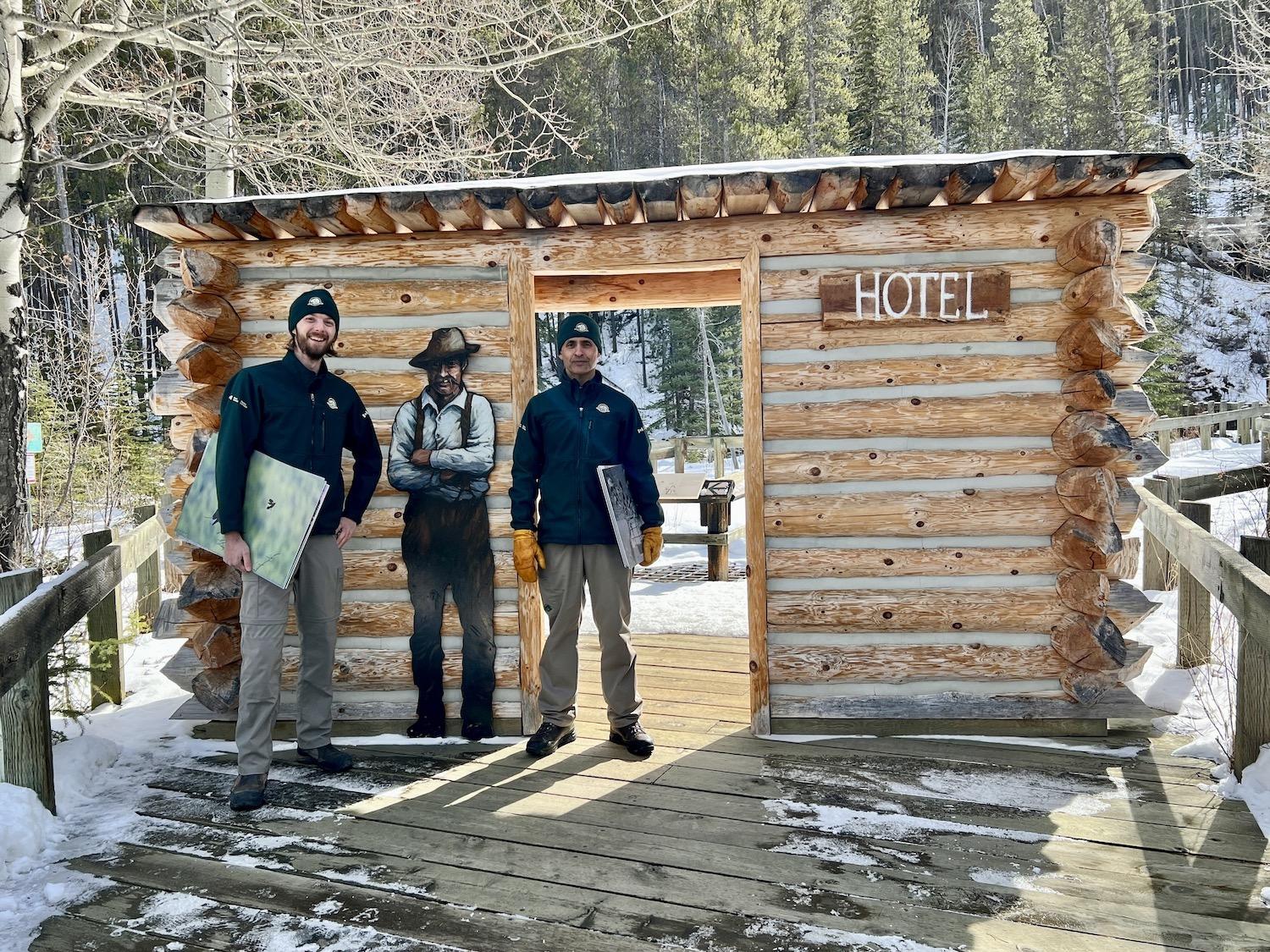 Cave and Basin's promotions officer Skyler Langendoen and team leader Amar Athwal stand by the spot where the cave's vent hole was found, and a shack that became the area's first "hotel" once stood.