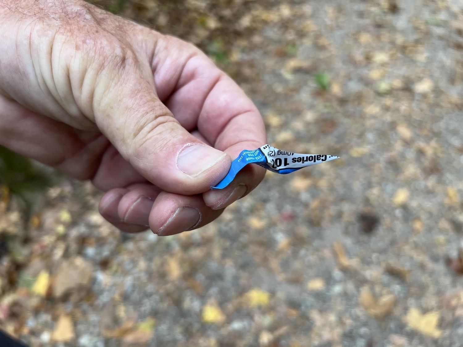 Mike Mills collects microtrash, usually the tiny end of a wrapper.
