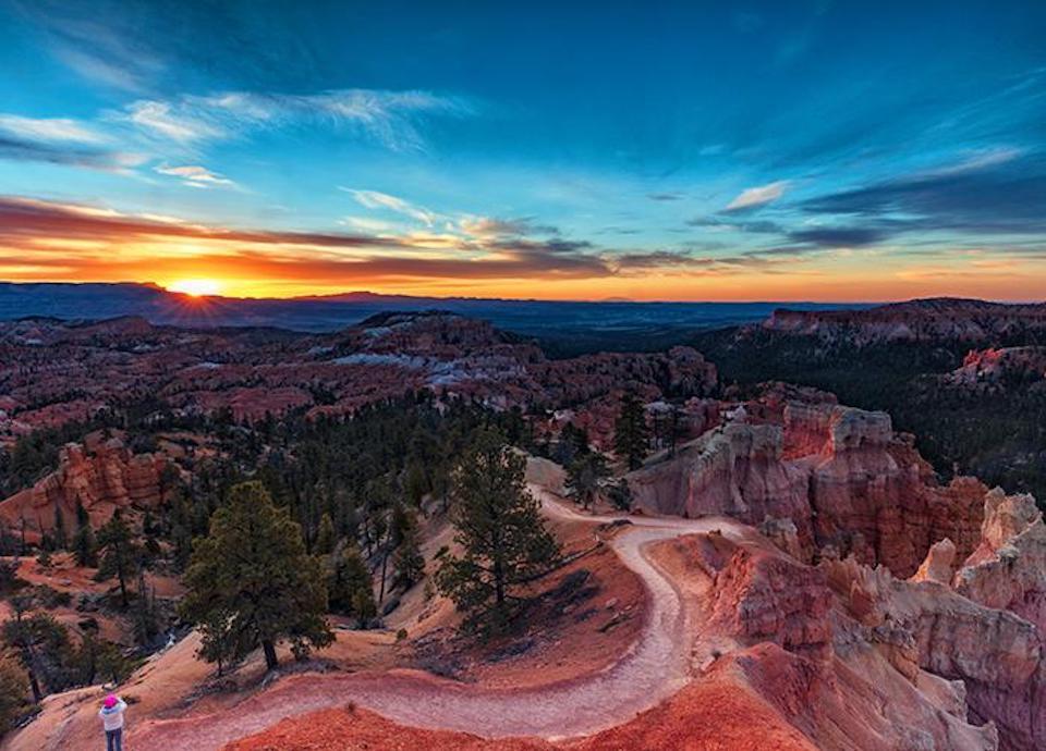 Watching the sunrise at Sunrise Point above the Queens Garden Trail, Bryce Canyon National Park / Rebecca Latson