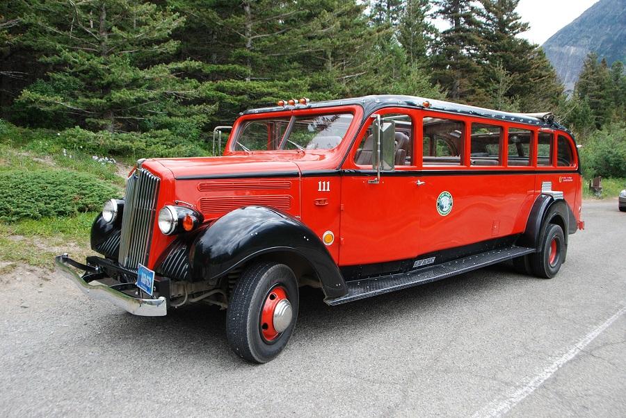 red buses, glacier national park, national park