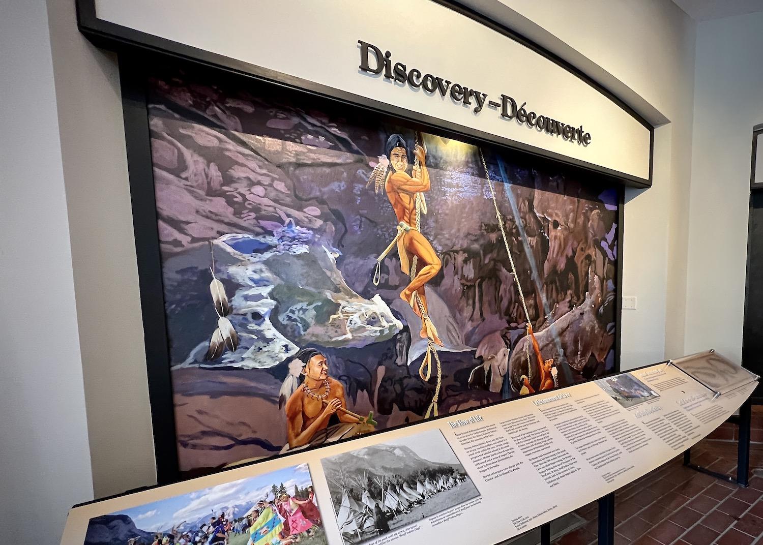 A mural depicts the Indigenous people who have known about the cave and thermal hot springs for thousands of years.