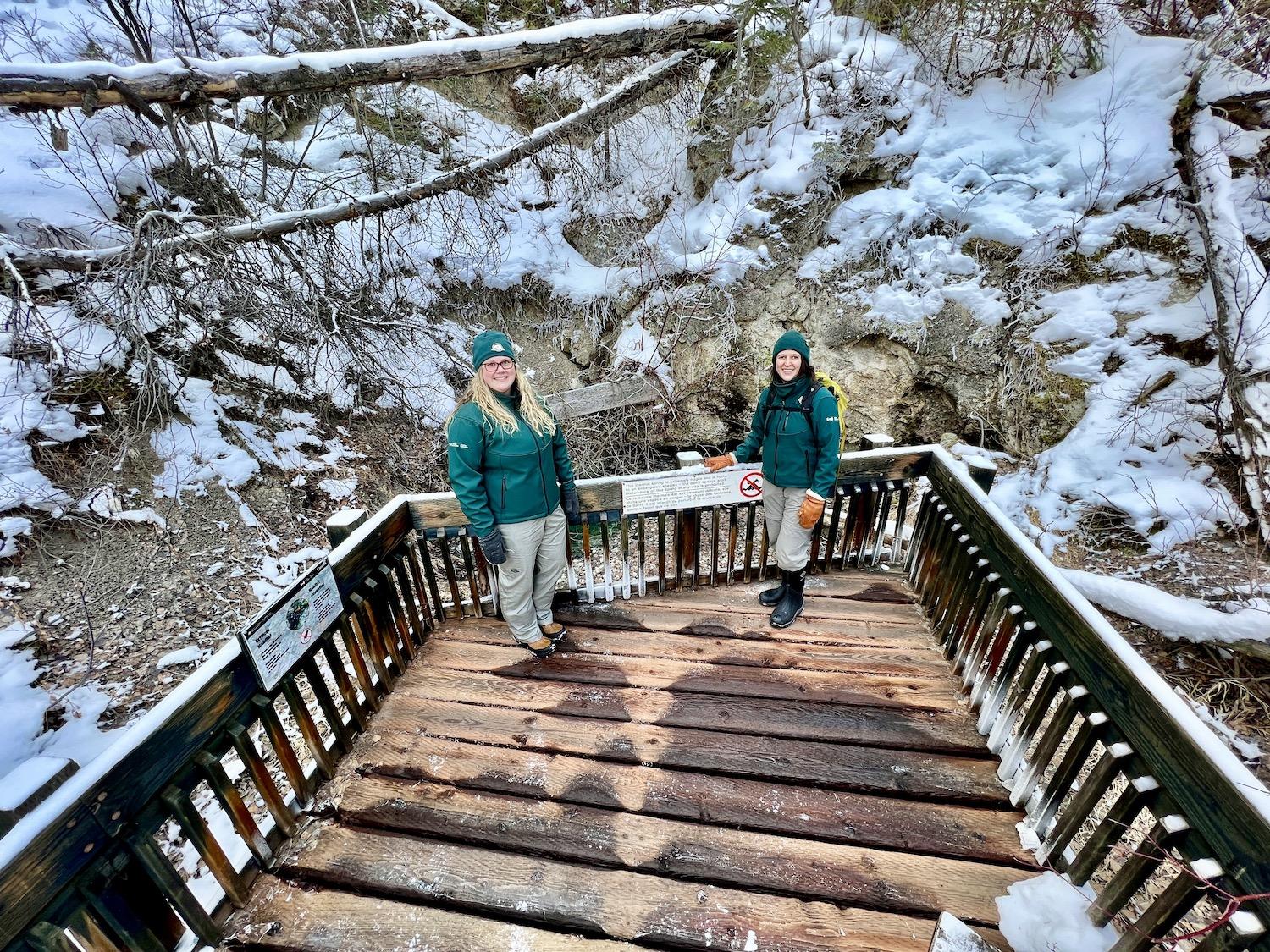 Endangered aquatic snails live in four thermal pools at Cave and Basin National Historic Site. Kira Tryon, a PR and communications officer for Banff National Park, and Kate Keenan, a resource conservation officer, stand by one of them.
