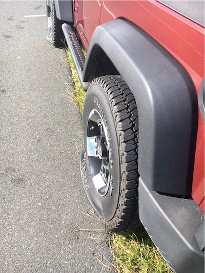 Slashed rear tire on a Jeep Wrangler at Cape Hatteras National Seashore/NPS 