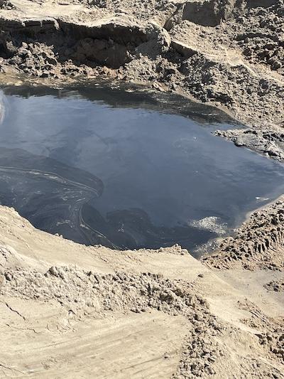 Photo taken during the Army Corps of Engineers project to respond to reports of fuel sheen and odors at the Buxton Formerly Used Defense Site.