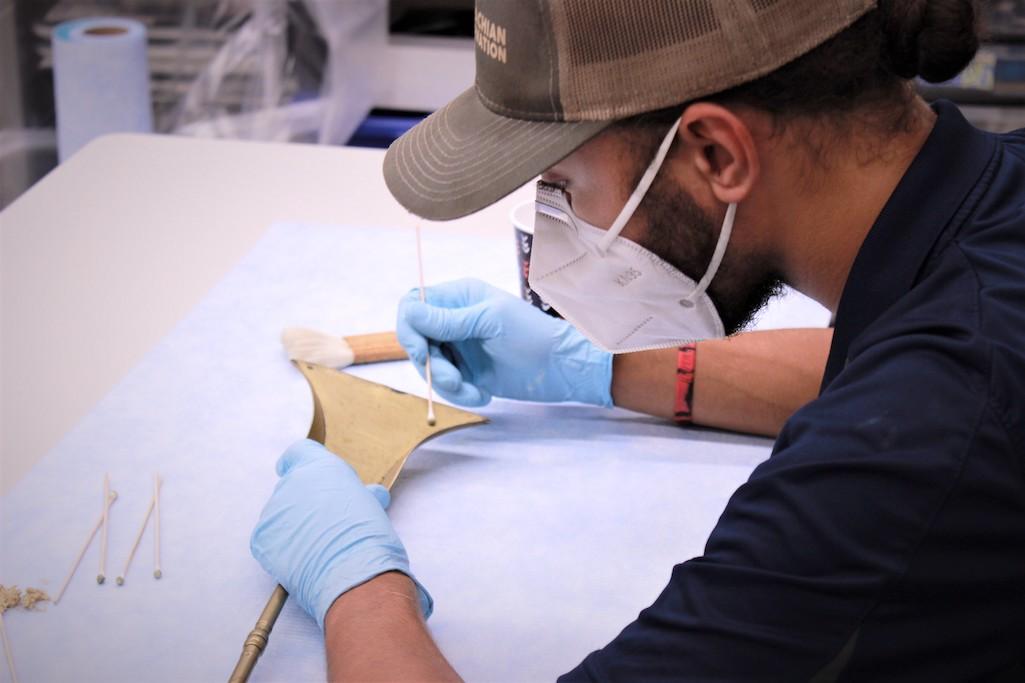 Connor Tupponce preparing cultural artifacts in the lab at Colonial National Historic Park. “On a weekly basis we spend time with all the park divisions,” Tupponce confirmed. “We go from maintenance to law enforcement to cultural resources and archeology,