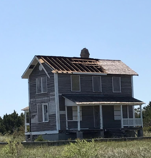 Built in 1907 as a lighthouse keeper's quarters and now known as the Barden House. Hurricane force winds removed not only the shingles but the underlying decking as well/NPS