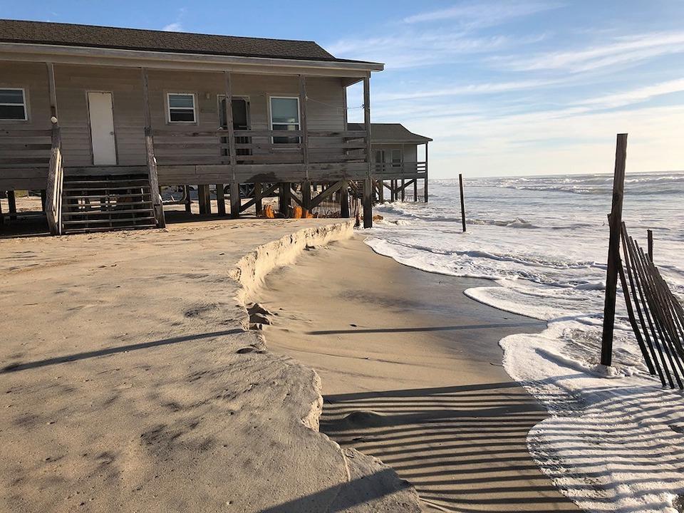 The Long Point cabins at Cape Lookout National Seashore are in danger of being destroyed by the surf if not moved/NPS file